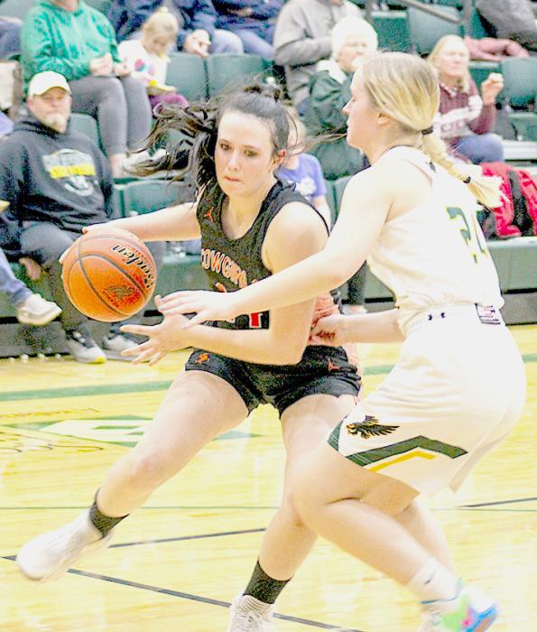 Mikah Vander Wey #14, drives to the basket against the Hawks. Photos by Shontell Roseberry
