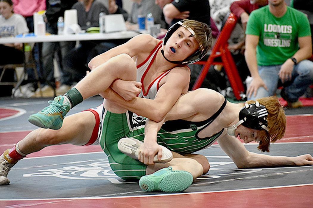 Robinson LaDeaux wrestled at 120# and placed first. Photos by DeanNa Fowler