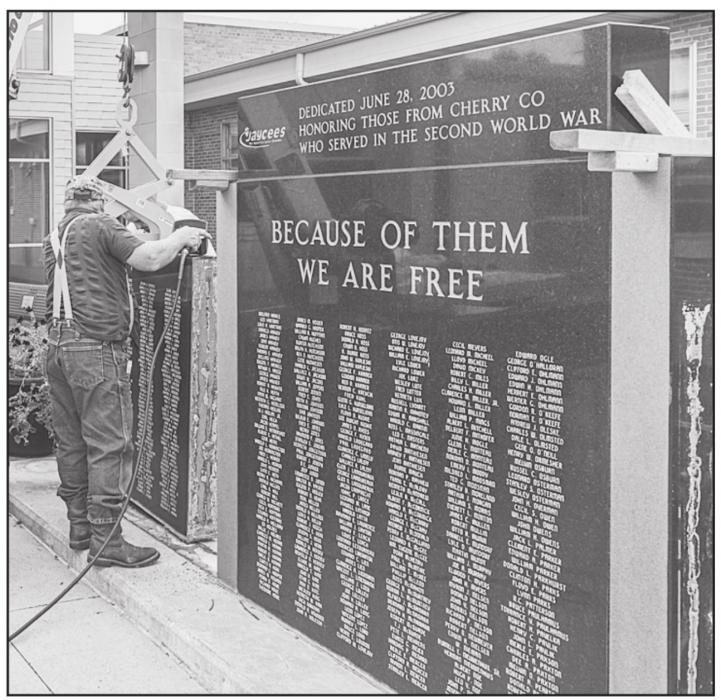 Hoffman Monuments braced and separated the WWII Monument that has been located on the front of the Cherry County Justice Center for the last 10 years. Before that, it was located between City Hall and the old County Court House. Photos by Laura Vroman