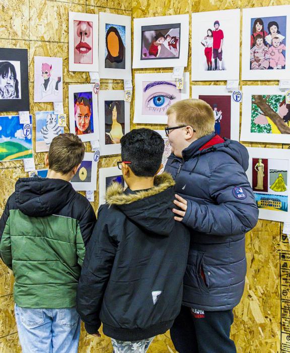 The fourth grade students got a chance to see the art that on display. These young men were enjoying exhibit.