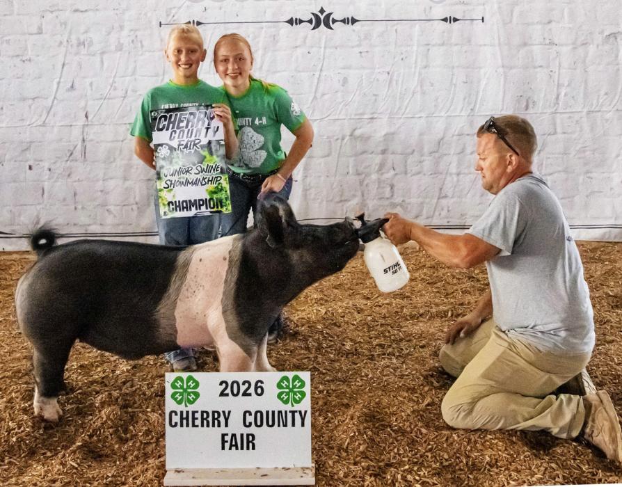 Pictured above is Lily Stec who had the Champion Junior Swine Showman. Pictured at left is Alexander Barnes with his Champion Market Swine. Photos by Tina Boone