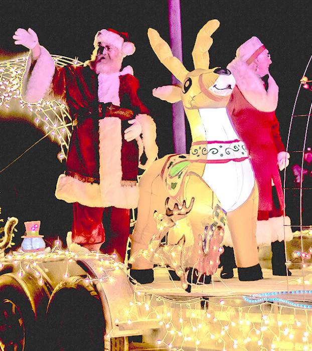 Last year, Santa and Mrs. Claus arrived on a lovely, lighted float! Perhaps they’ll be there for the 8th annual Valentine’s Heart of Christmas Celebration! Photo by Laura Vroman