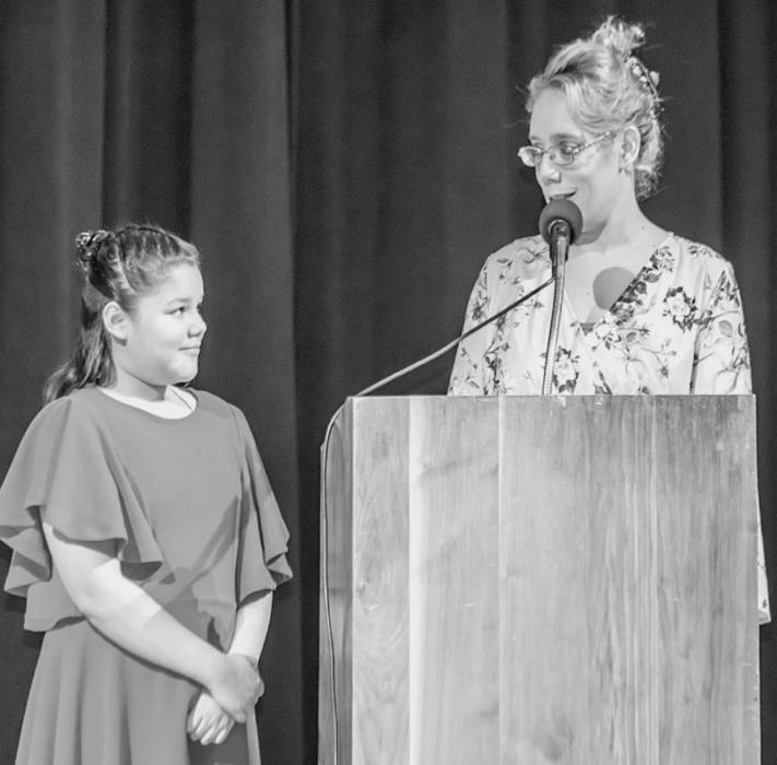Sophia Davis and Amanda Davis read a scripture that was submitted by My Bridge Radio. Sophia shared a prayer.