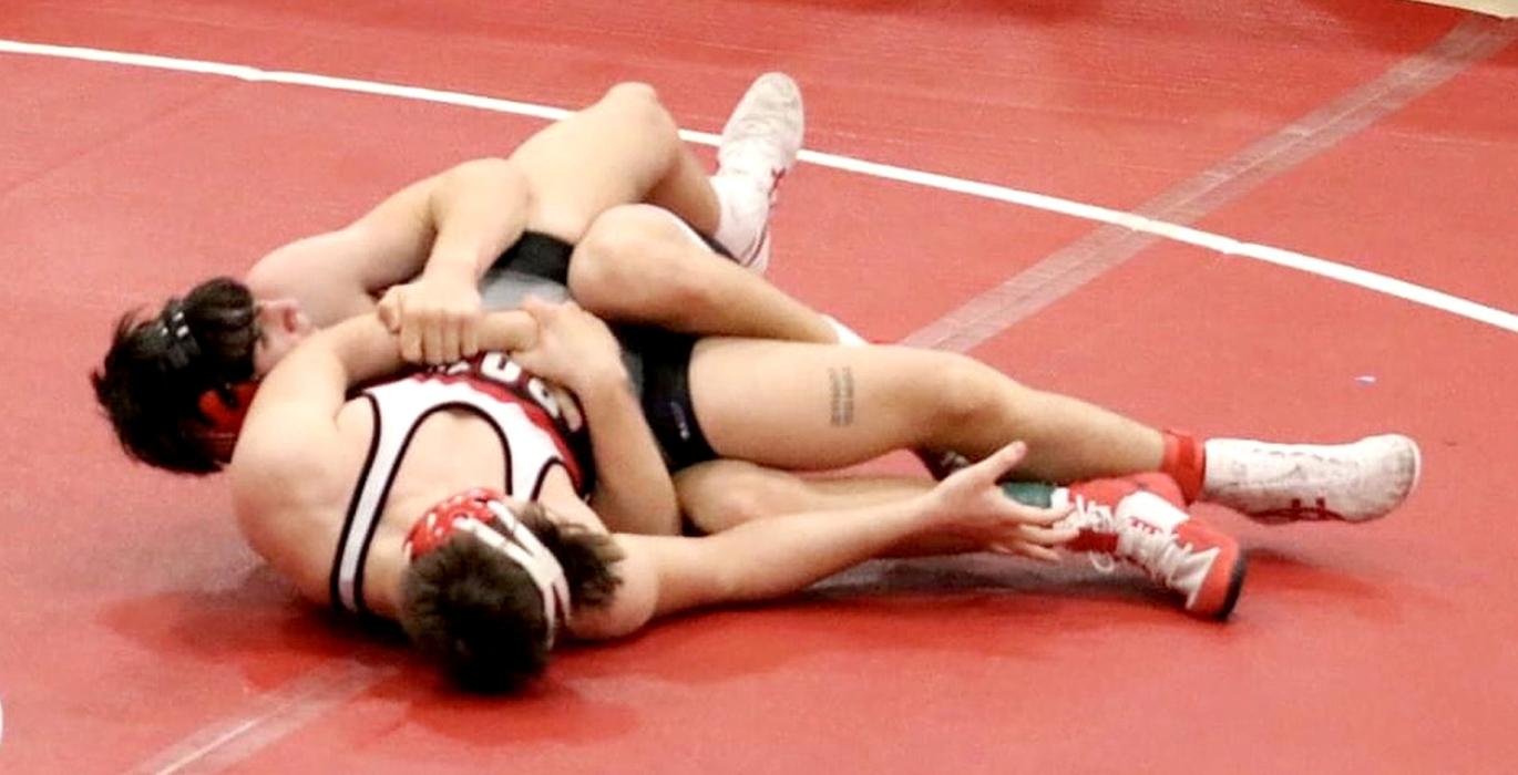 Trace Buechle wrestled at 165 pounds.