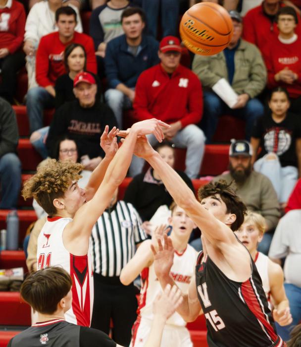 Isaac Cronin #15 has his eye on the ball as Kimball takes a shot.