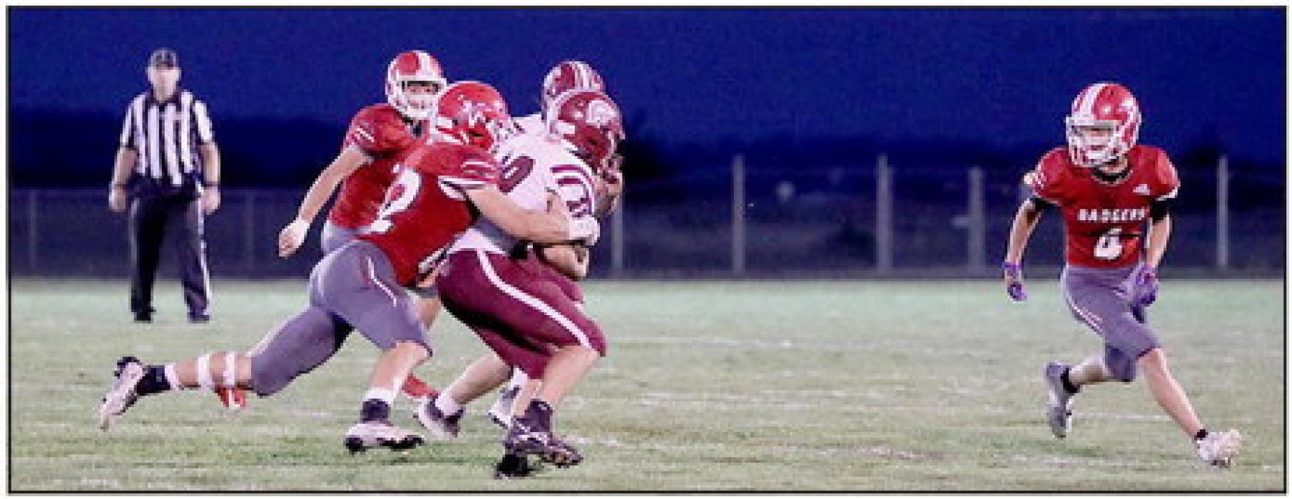 Jordan Bailey #22 tackles Centura’s ball carrier.