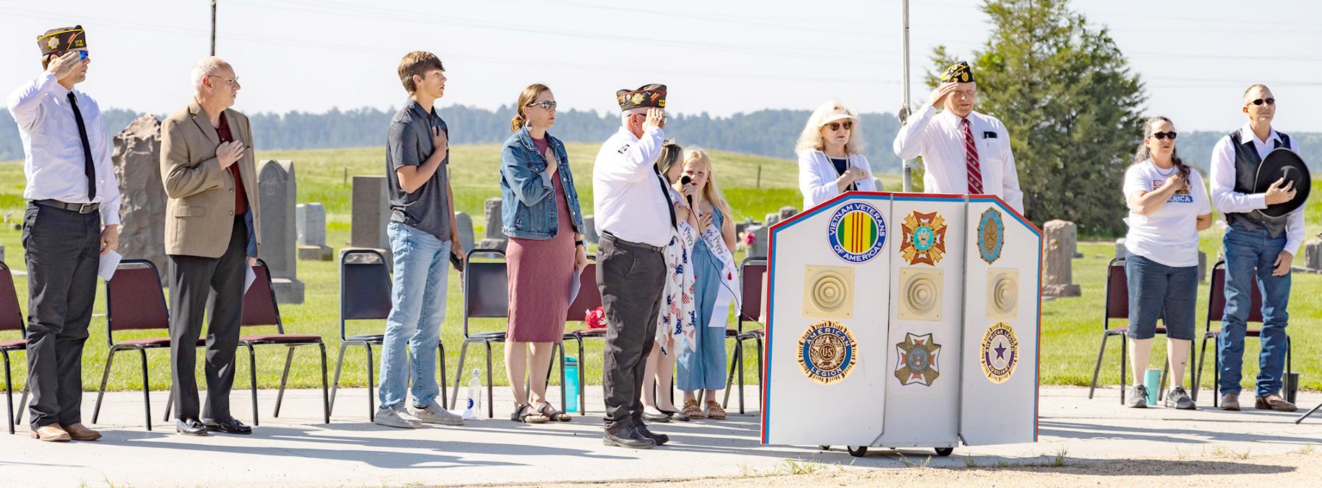 Pictured at the Memorial Day service held Monday, May 29, at Mount Hope Cemetery in Valentine are from L to R: Tim Witte, Pastor Tim Wilkinson, Nathan Perrett, Jennie Manning, Rex Gallino, Darby Murphy, Maggie Arnold, Virginia Nelsen, Don Nelsen, Kitty VanderWey, Rick VanderWey. Photos by Laura Vroman