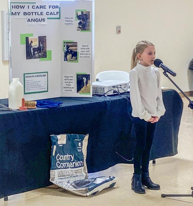 Charlotte Tenhouse delivers an illustrated presentation on the topic of How I Care for My Bottle Calf.