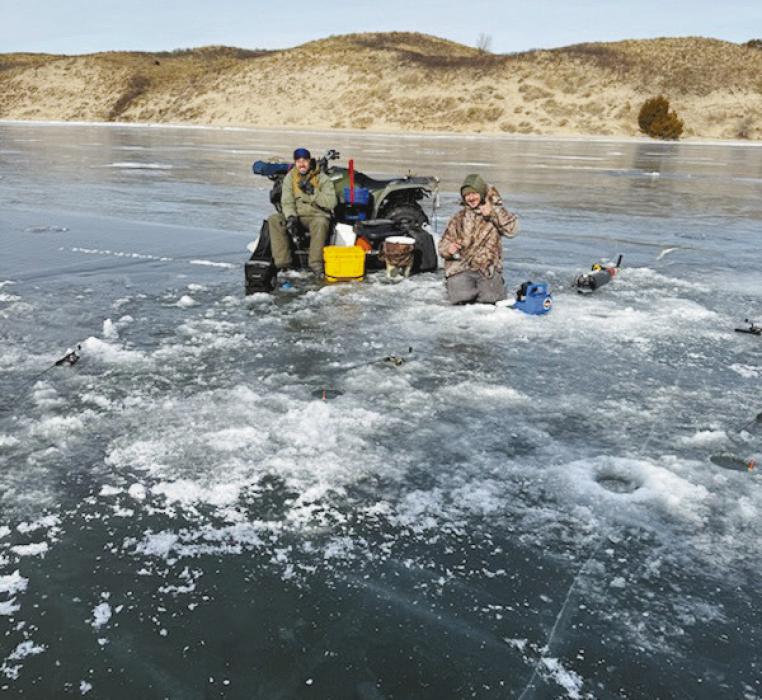 Blue skies, smooth ice, and a great day for the Cork Thornton Memorial Ice Fishing Tournament. Photo by Jenny Moore