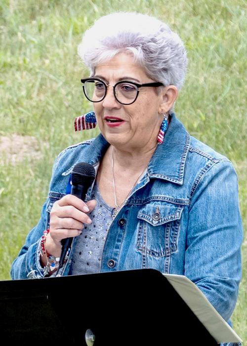 Special Guest Speaker, Gold Star Mother Kelly Hollopeter shared information about the three war dead buried in Mount Hope Cemetery. to a breathtaking beautiful blue sky and the freedom to carry out the day.