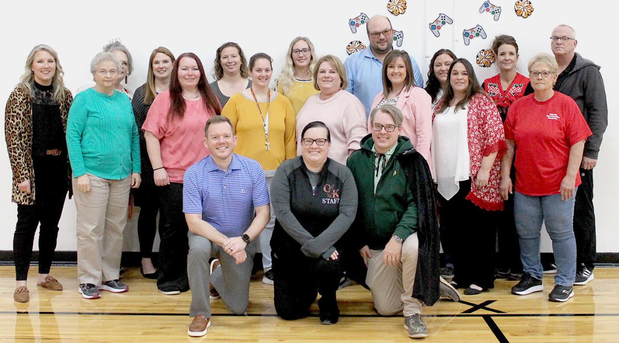 Back row, L to R: Kristin Fay, Leslie Roseberry, Janell Naslund, KayDee Burchfield, Bentley Jenkins, Justin Nollette, Bailie Mills-Burress, Angela Anderson, Tim Hamilton. Middle row, L to R: Rocky Richards, Samantha McWhirter, Mary Kay Ford, Carrie Ford, Liz Ravenscroft, Beth Jones, Sherri Westover. Front row, L to R: Tony Galvin, Jodi Arnold, George Arnold.