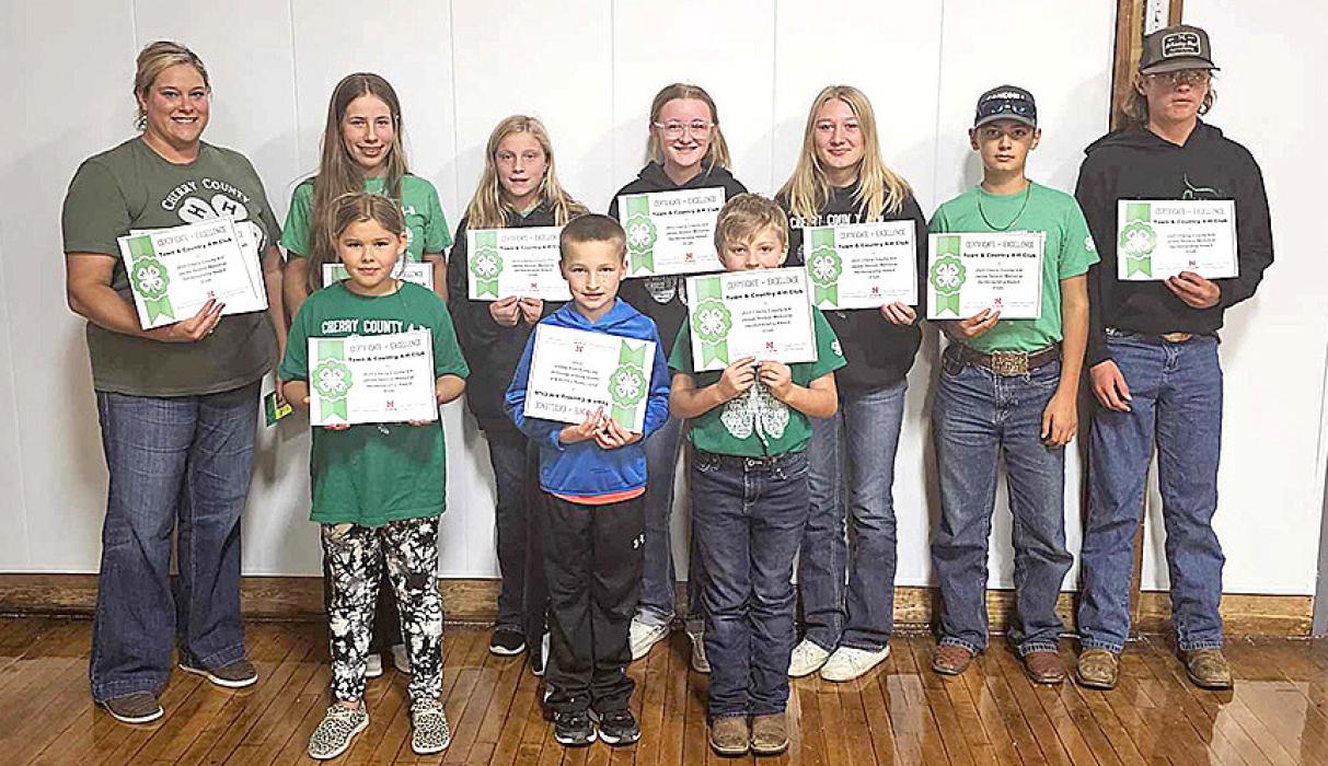 Town &amp; Country 4-H Club winners of the James Sexson Memorial Herdsmanship Award are pictured, back row, L to R: Club Leader Bodell Bacholor, Annalena Nelson, Sadie Bachelor, Mady Bopp, Keeleigh Burge, Kaden Garwood, Greyson Hollopeter Swan. Front row L to R: Kyra Garwood, Case Larson-Talich, Kamen Garwood.
