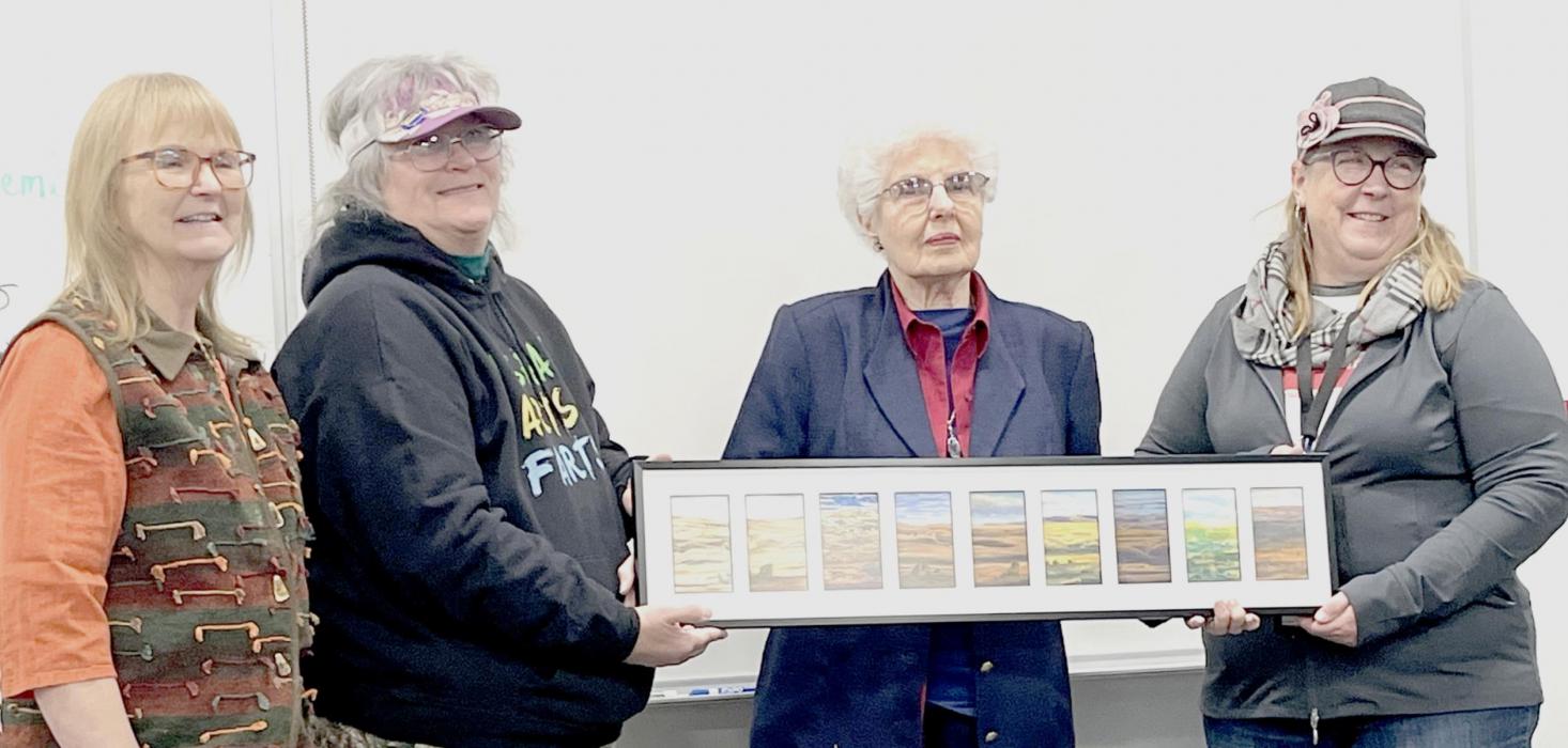 Pictured are from L to R: Debby Galloway, Pat Schemmer, Mary Eatinger, and Sand Painters Art Guild President Joan Swim.