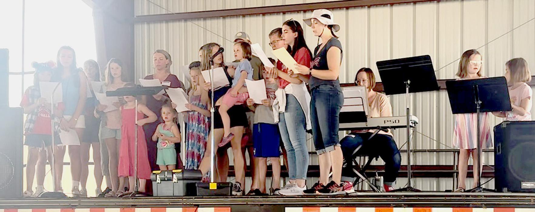 Later in the God and Music Festival program, the Nolting family played and sang. Photo by Cindy Williams