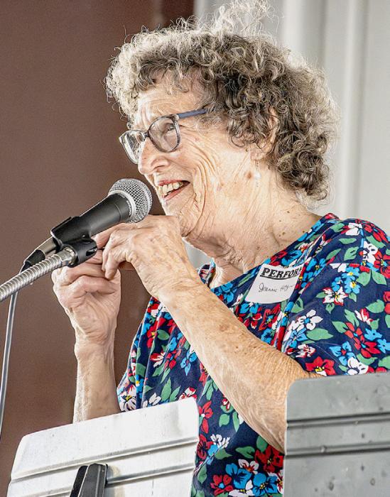 Jeannie Hoffman, above, played God Bless American on harmonica as one of her songs; MJ McMillan, left, shared a poem he wrote Hope of Heaven, a very picturesque vision of how he hoped Heaven would be when he arrived.