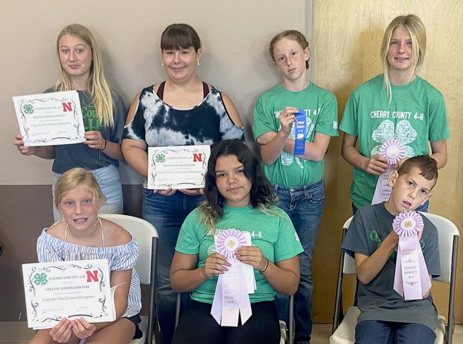 Cupcake War participants, are pictured back row L to R: Keeleigh Burge, Ruby Shelbourn, Elyse Cochran, Christen Larson-Malard. Front row, L to R: Sadie Bachelor (also in Table-Setting contest), Sophia Estrada, Tyson Cochran.