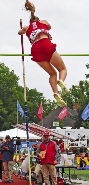 Danika Janssen pole vaults 9’6”.