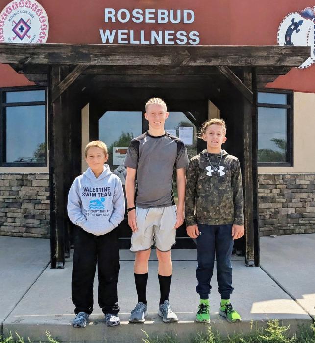 Brothers Wade Daugherty, 13, center, and Duke Daugherty, 11, far right teamed up with their friend River Ruby, 11, pictured far left, to form a three-person team called Three Little Legends.