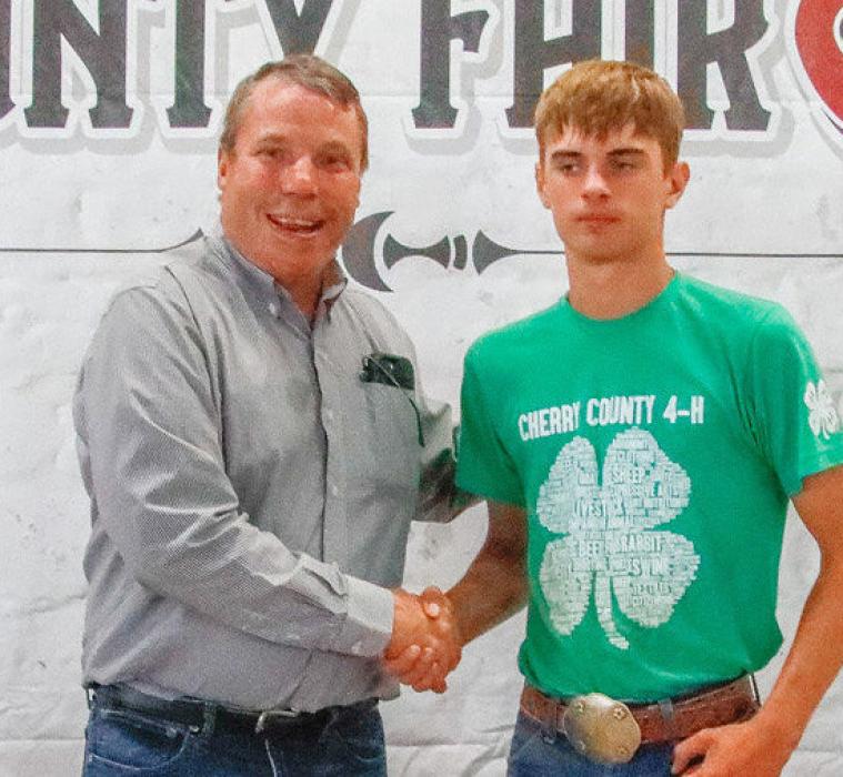 Champion Heifer Greyson Hollopeter - Sandhill Oil.