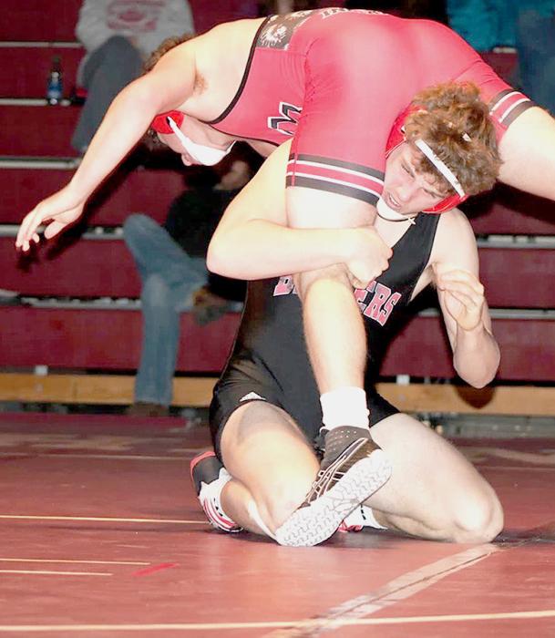 Ashton Lurz, 160# flips his opponent in the Ogallala Triangular.