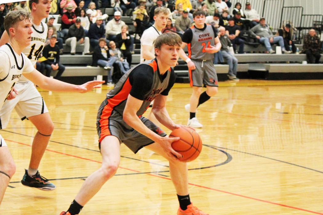 CK senior Cash Cooper #3 looking for an outlet during action in the D2-12 subdistrict final against the Mullen Broncos. Photos by CK Kynzee McConaughey