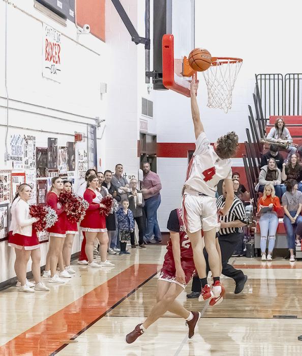 Dominic Beebout #4 makes an easy 2. Photos by Laura Vroman