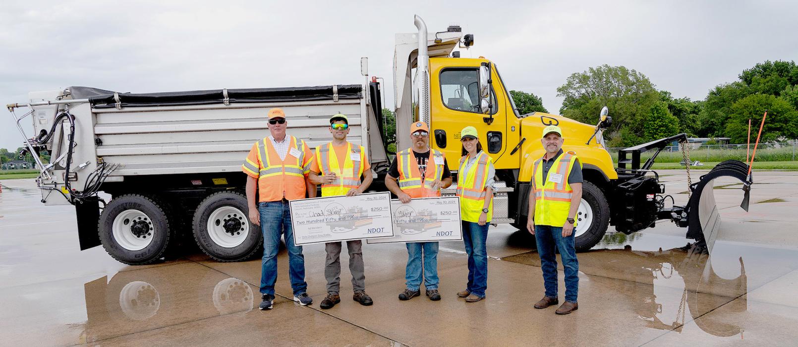 Pictured are from L to R: District 8 engineer Mark Kovar, District 8 winners Chad Shaul and Tyrel Yager, and NDOT Director Vicki Kramer.