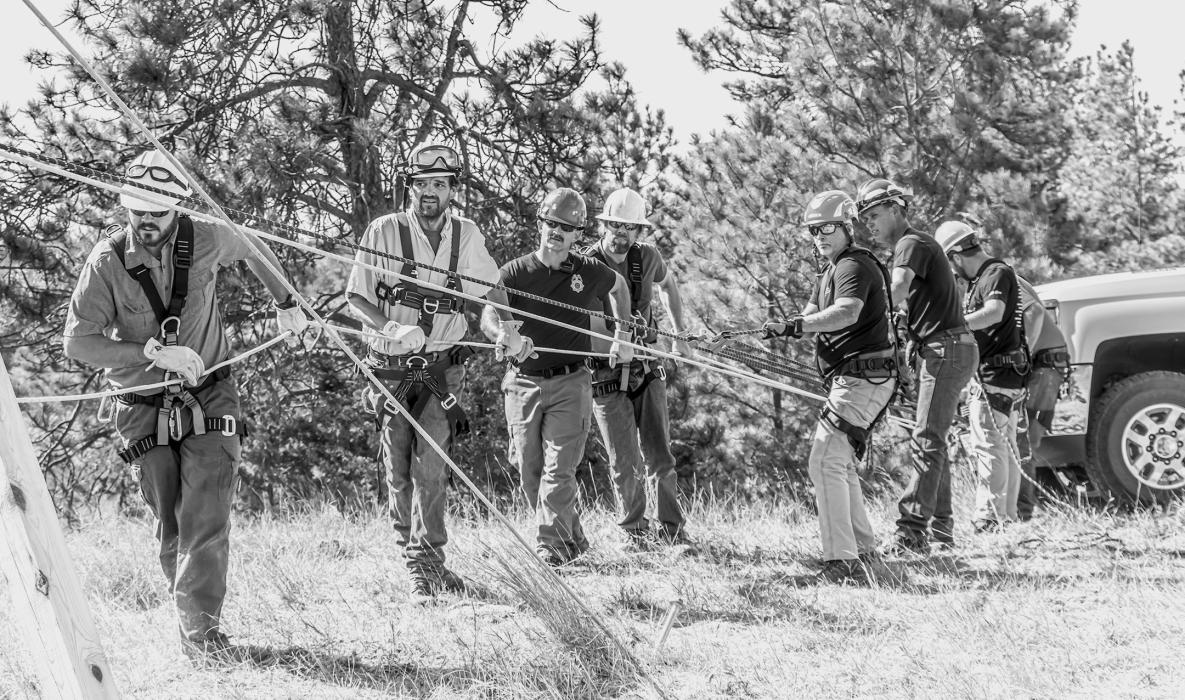 Using physics, an A frame, 4WD truck bumper and manpower, a “patient” was traversed over a small ravine, as close to the ground as possible, during a weekend of rope training exercises with the State Fire Marshall’s training team. Photos by Laura Vroman