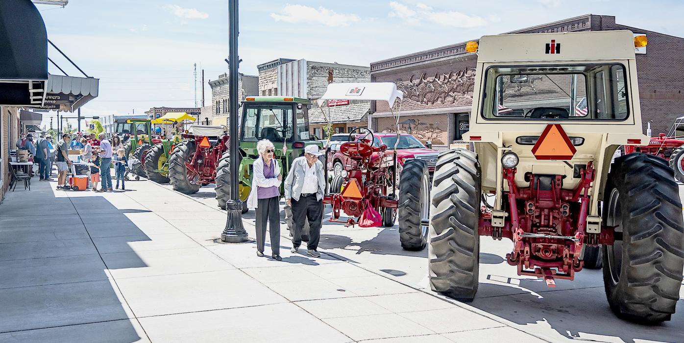 Richard and Faye Bachelor came down from South Dakota to look at the antique tractors. Richard remembers working with his father’s tractors which had metal wheels. Photos by Laura Vroman