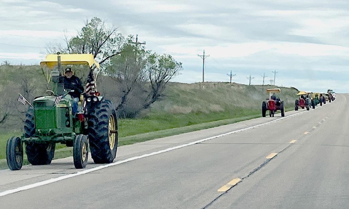 Headed down Highway 20 was the Tractors Across Nebraska caravan. Photo by Dana Anderson
