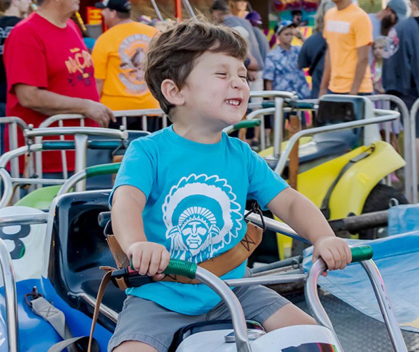 This little one had the VERY best time at the Cherry County Fair on the motocross ride!
