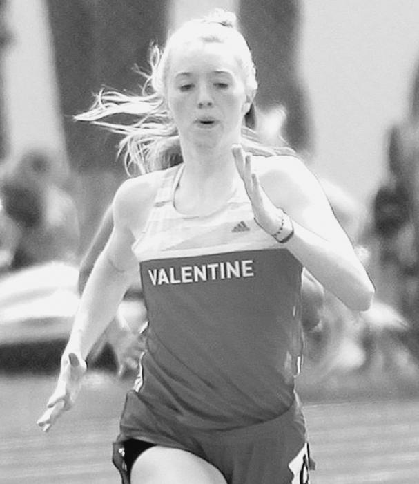 Izzy Salters in the 200 Meter Dash. Photos by Amanda Long