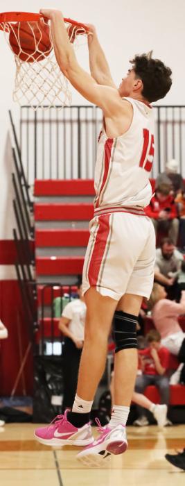 Isaac Cronin #15 with a crowd pleasing slam dunk in the game against Stuart!