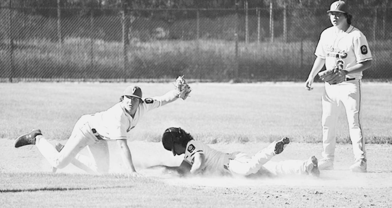 Tagg Buechle catches a ball tagging the Martin player out. Photos by DeanNa Fowler
