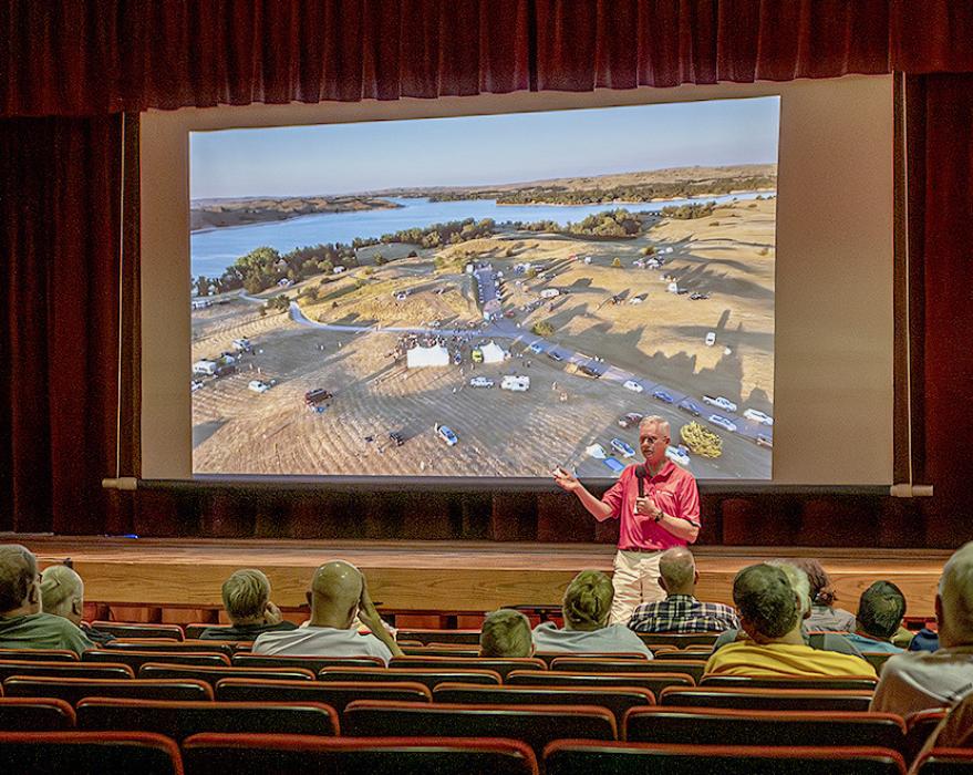 Guest speaker Greg Bragg shows an aerial view of Nebraska Star Party’s venue at the Snake Campground at Merritt Reservoir - which can be seen off in the distance. He shared information about the eye pieces for telescopes. Photos by Laura Vroman