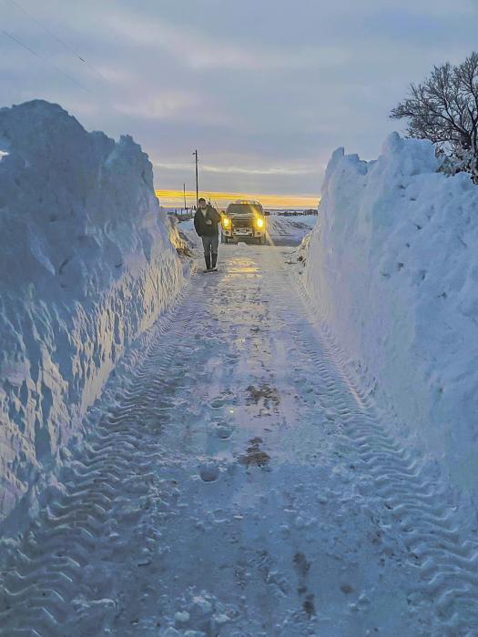 Photo courtesy of Michelle Garwood Clearing a way into the Dick Stiefel’s place north of Crookston.