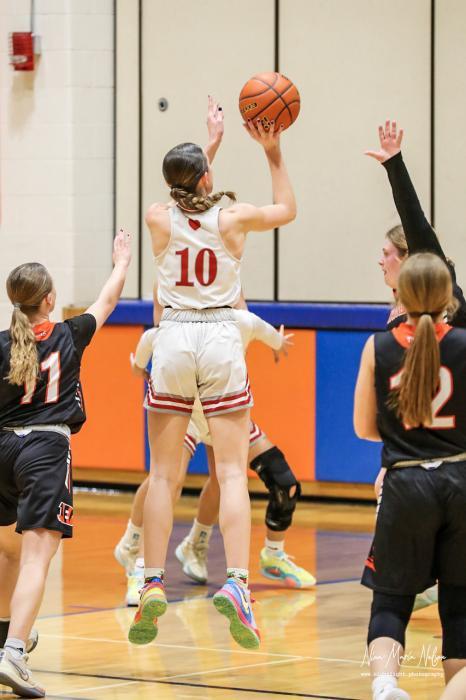 Maeli Patterson #10 going up for a jump shot.
