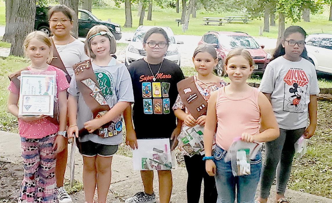Girls that bridged to Juniors are pictured from L to R: Kayleigh Harms, Shania Kent, Darby Murphy, and Cecilia Estrada along with Brownies Kyra Garwood, Kaylee Luthy, and Alycia Davis.