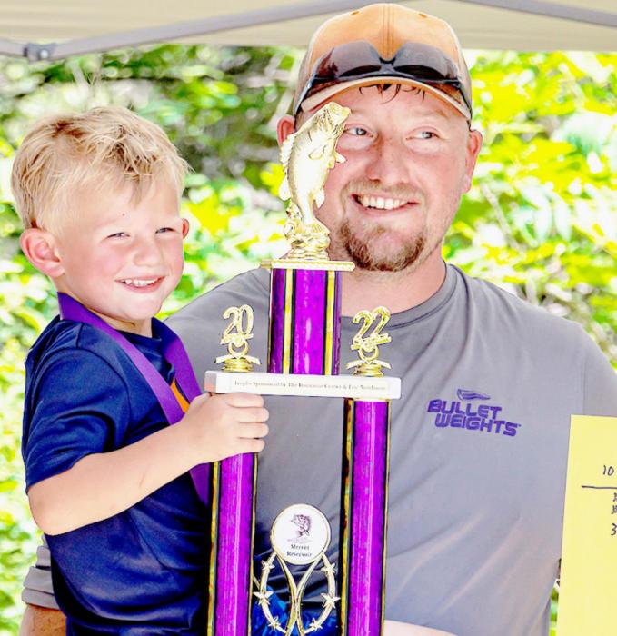First year participant three year old Watson and his Dad, Brad Michalek, who placed second in the 10 and Under Division.