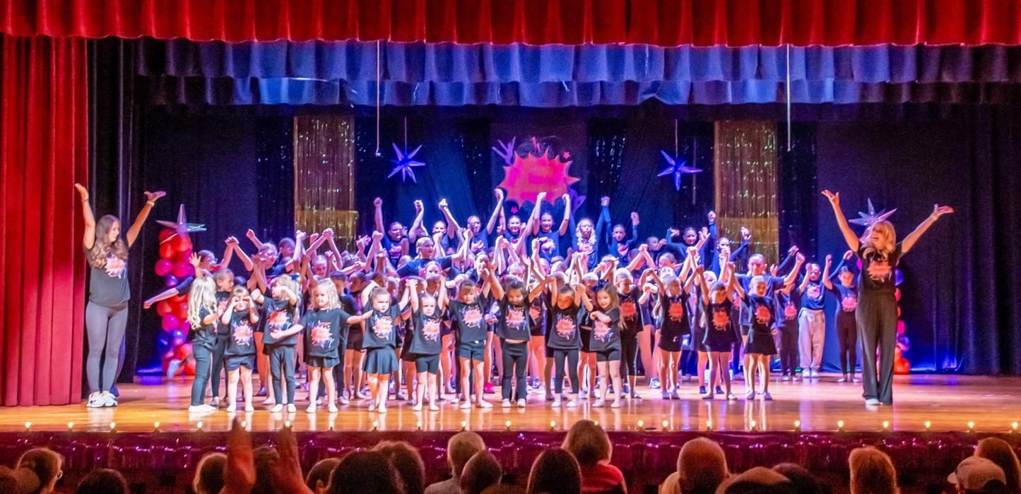 The program comes to a conclusion after an amazing Grand Finale, and all the dancers take a bow to the delight of the audience. Photos by Tina Boone