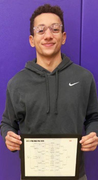Jekhi Williams brings home Champion in the 132lb bracket.