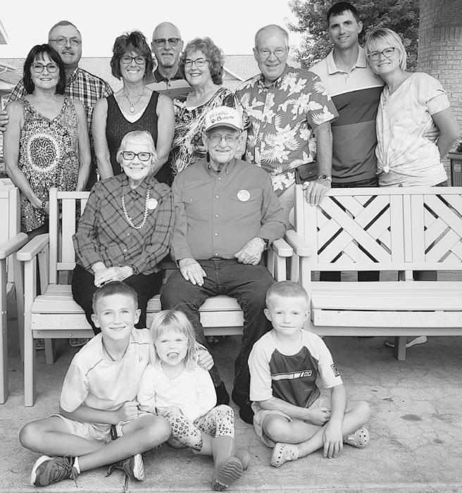 Glen Huddle was selected as the 2021 Hometown Hero and is pictured seated with his wife, Darlene, and family.