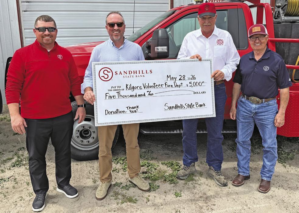 Pictured in Kilgore are from L to R: Market President Zane Limbach, President Kyle Arganbright, Kilgore Fire Chief Todd Rothleutner, Regional President Monty Neiffer.