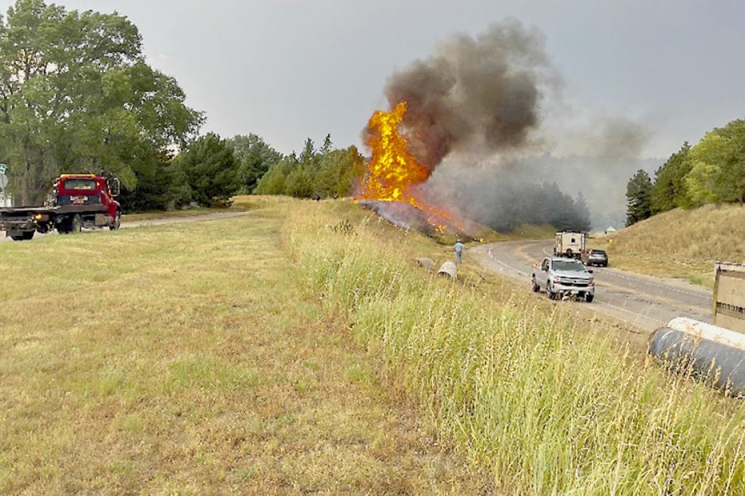 A fire began after a semi accident occurred Thursday, August 4, 2022. You can see the semi at the bottom right, and the fire that ignited and got into the trees which kept firefighters busy. Courtesy photo