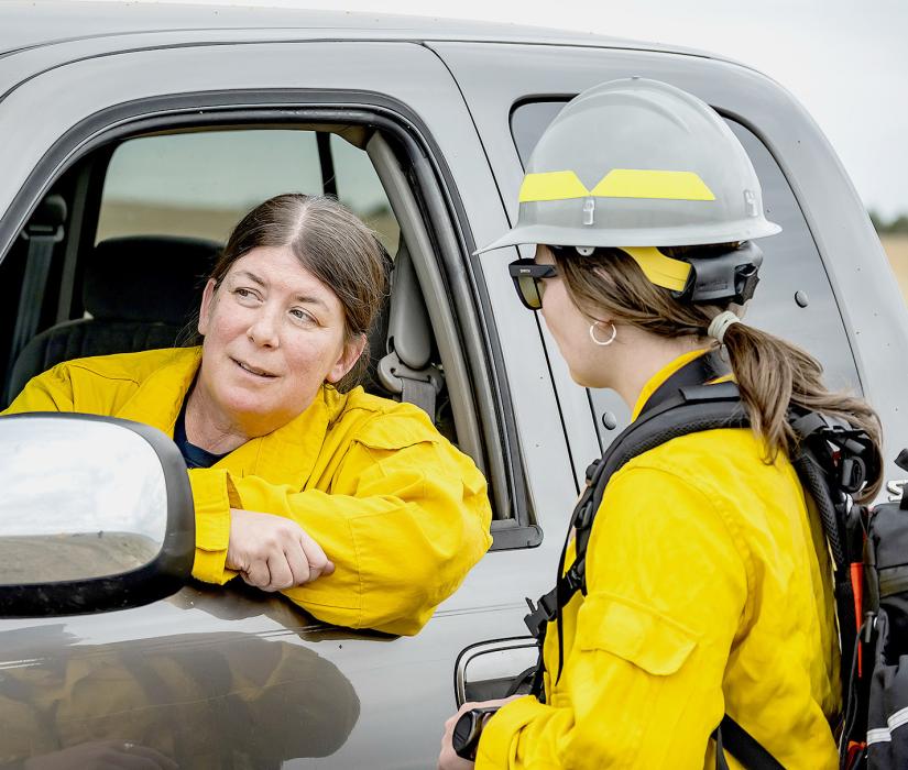 Cartographer Chris “Fern” Ferner creates maps for the firefighters to use when planning a burn. She explained that some of the maps needed to have different colors to help colorblind firefighters out in the field.