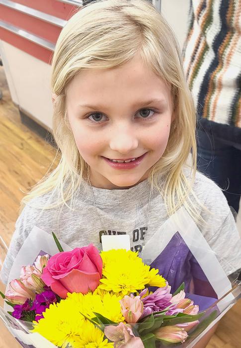 Rayna Castellaw shared a bouquet of flowers - just to make me happy. Photo by Laura Vroman