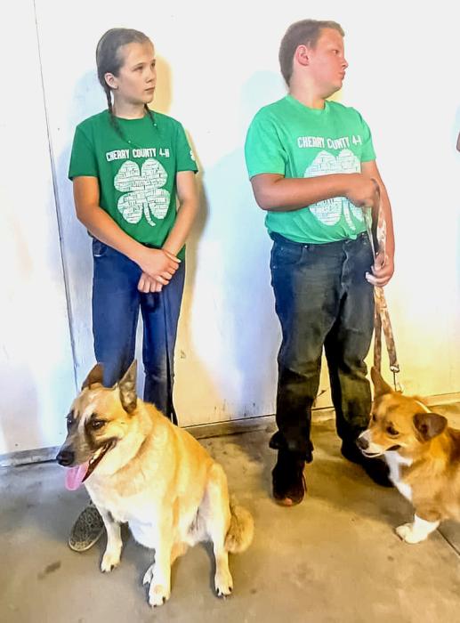 Elise Brown and Henry Johnson with their pups.