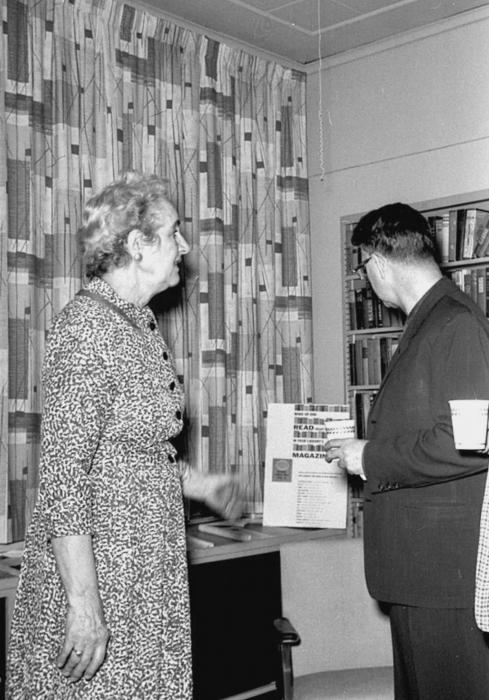 Sylvia Quigley at a businessman coffee event 1960s.