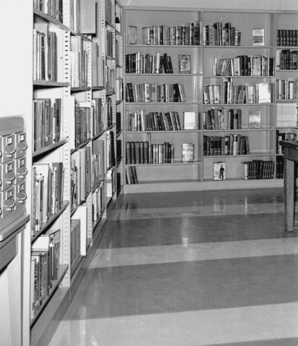 Above, Valentine City Hall construction began in 1937 and was completed in the summer of 1938. The library was moved to the upstairs in September. The library is pictured, at right, in the Valentine City Hall where it was housed from 1938 through 1968. Several events were held including book discussions, businessmen’s coffee events, and children’s story time.