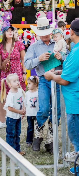 This dad is a hero! Look at all those tickets for great fun on the carnival rides!